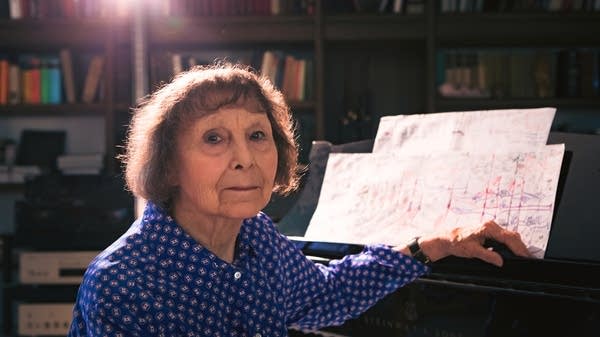 Poster Russian composer Sofia Gubaidulina sits at a piano