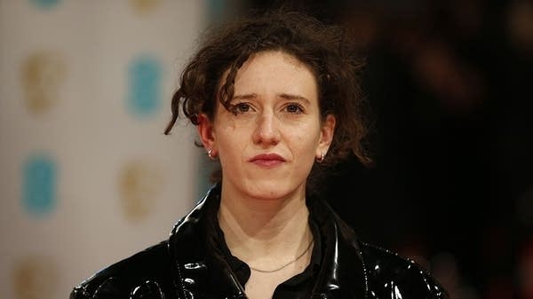 Mica Levi poses on the red carpet for the BAFTA Film Awards